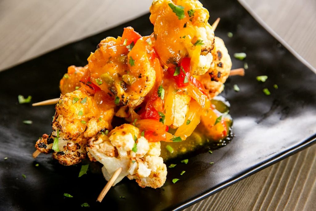 Closeup or cauliflower pinchos or kebabs