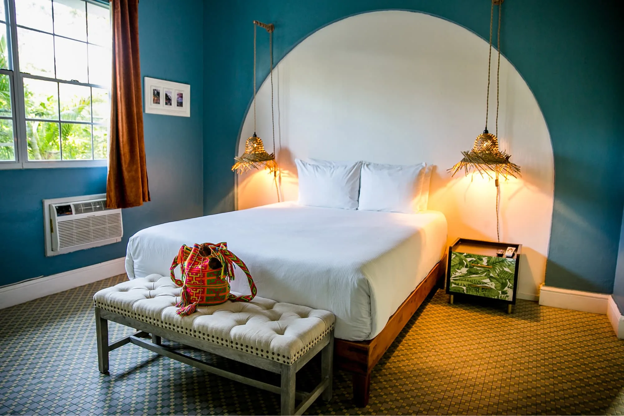 the sleeping area and bed of the beach house apartment